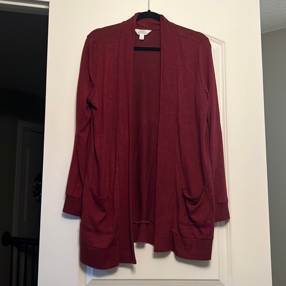 Long, open front cardigan. Cross between maroon and rust.